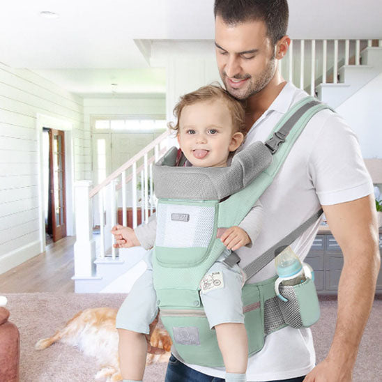 porte bébé physiologique vert langue bébé sourire papa